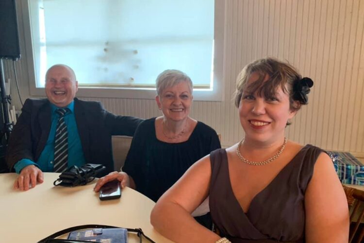 Dad, Mom, and me at my Brother's Wedding.
